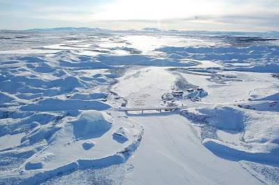 Aerial view of Maclaren checkpoint – you can see the straw from dog teams on the river.